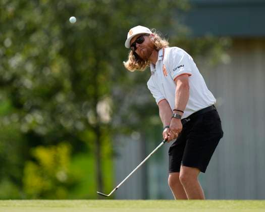 28th July 2024; JCB Golf &amp; Country Club, Rocester, Uttoxeter, England; LIV UK Golf League, Final Round; Scott Vincent of the Iron Heads GC warms up on the practice ground before the final round  ActionPlus12673264 StevenxFlynn