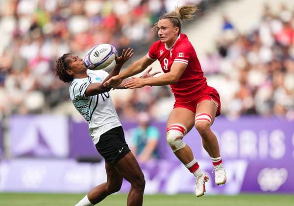 July 28, 2024, Paris, FRANCE: Canada forward Krissy Scurfield (9) battles for the loose ball against Fiji forward Laisana Likuceva (10) during second half Women rugby 7s rugby action at the Paris Summer Olympics in Paris, France on Sunday, July 28, 2024. Canada News - July 28, 2024  - ZUMAc35_ 20240728_zaf_c35_049 Copyright: xNathanxDenettex