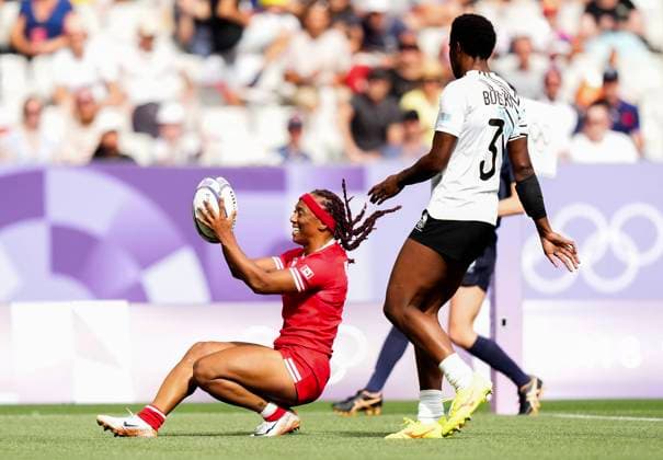 July 28, 2024, Paris, FRANCE: Canada back Charity Williams (6) scores a try past Fiji forward Adi Vani Buleki (3) during first half Women rugby 7s rugby action at the Paris Summer Olympics in Paris, France on Sunday, July 28, 2024. Canada News - July 28, 2024  - ZUMAc35_ 20240728_zaf_c35_057 Copyright: xNathanxDenettex