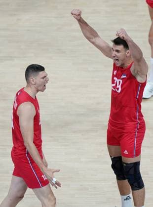 (240728) -- PARIS, July 28, 2024 -- Marko Podrascanin (L) and Aleksandar Nedeljkovic of Serbia celebrate during the volleyball men s preliminary round pool A match between France and Serbia at Paris 2024 Olympic Games, Olympische Spiele, Olympia, OS in Paris, France, July 28, 2024. ) (PARIS2024) FRANCE-PARIS-OLY-VOLLEYBALL LixGang 