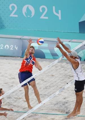 (240728) -- PARIS, July 28, 2024 -- Christian Sandlie Soerum (L) of Norway competes during the men s pool B Beach volleyball, Beachvolleyball match between Norway and Chile at the Paris 2024 Olympic Games, Olympische Spiele, Olympia, OS in Paris, France, on July 28, 2024. ) (PARIS2024)FRANCE-PARIS-OLY-BEACH VOLLEYBALL HuangxZongzhi 