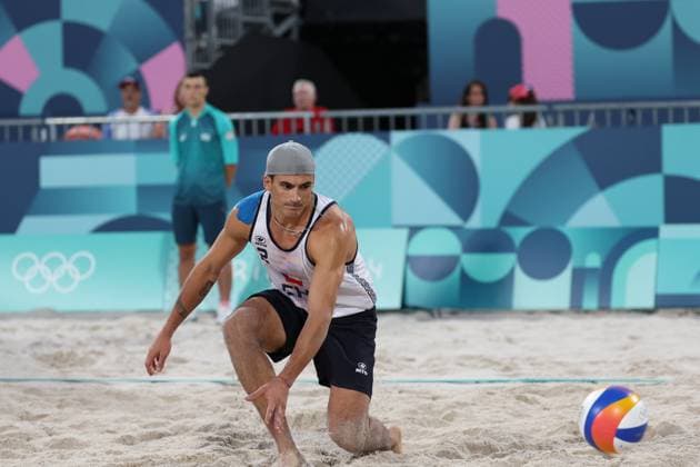 (240728) -- PARIS, July 28, 2024 -- Esteban Grimalt of Chile competes during the men s pool B Beach volleyball, Beachvolleyball match between Norway and Chile at the Paris 2024 Olympic Games, Olympische Spiele, Olympia, OS in Paris, France, on July 28, 2024. ) (PARIS2024)FRANCE-PARIS-OLY-BEACH VOLLEYBALL HuangxZongzhi 