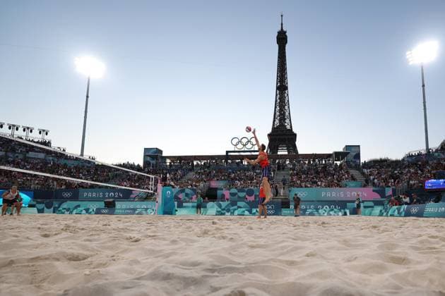 (240728) -- PARIS, July 28, 2024 -- Anders Berntsen Mol (front, top) of Norway serves during the men s pool B Beach volleyball, Beachvolleyball match between Norway and Chile at the Paris 2024 Olympic Games, Olympische Spiele, Olympia, OS in Paris, France, on July 28, 2024. ) (PARIS2024)FRANCE-PARIS-OLY-BEACH VOLLEYBALL HuangxZongzhi