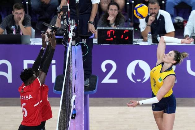 (240729) -- PARIS, July 29, 2024 -- Rosamaria Montibeller (R) of Brazil spikes the ball during the women s preliminary round pool B of volleyball between Brazil and Kenya at the Paris 2024 Olympic Games, Olympische Spiele, Olympia, OS in Paris, France, July 29, 2024. Li Gang) (PARIS2024) FRANCE-PARIS-OLY-VOLLEYBALL ligang 