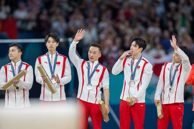 Artistic Gymnastic - Olympic Games, Olympische Spiele, Olympia, OS Paris 2024: Day 3 Silver medalists Team China is posing on the podium during the medal ceremony for the Artistic Gymnastics Men s Team Final on day three of the Olympic Games Paris 2024 at Bercy Arena in Paris, France on July 29, 2024. Paris France  Copyright: xAndrzejxIwanczukx originalFilename:iwanczuk-artistic240729_np6Ex.jpg