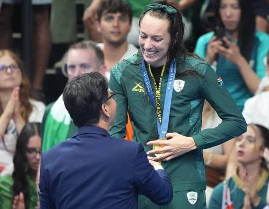Tatjana Smith of South Africa receives her gold medal after winning the Women s 100m Breaststroke Finals at the Paris 2024 Olympics at the Arena Le Defense in Paris, France on Monday, July 29, 2024.  OLY202407291636 RICHARDxELLIS