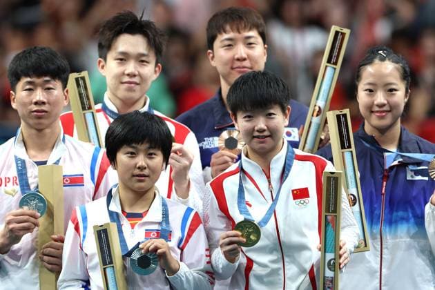 Sport Themen der Woche KW31 Sport Bilder des Tages (240730) -- PARIS, July 30, 2024 -- Gold medalists Wang Chuqin Sun Yingsha of China, silver medalists Ri Jong Sik Kim Kum Yong of the Democratic People s Republic of Korea and bronze medalists Lim Jonghoon Shin Yubin of South Korea attend the awarding ceremony after the mixed doubles gold medal Table tennis, Tischtennis match at the Paris 2024 Olympic Games, Olympische Spiele, Olympia, OS in Paris, France, on July 30, 2024. Liu Xu) (PARIS2024)FRANCE-PARIS-OLY-TABLE TENNIS liuxu 