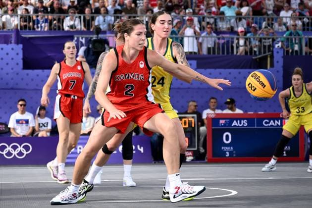 OLY24 3X3 BASKETBALL, Katherine Plouffe of Canada (left) and Anneli Maley of Australia (right) during the Women?s 3x3 Basketball match between Australia and Canada at La Concorde Urban Park as part of the 2024 Paris Summer Olympic Games, Olympische Spiele, Olympia, OS in Paris, France, Tuesday, July 30, 2024. ( NO ARCHIVING, EDITORIAL USE ONLY, NO USE IN BOOKS WITHOUT CONSENT PARIS FRANCE Copyright: xJOELxCARRETTx 20240731192545787458