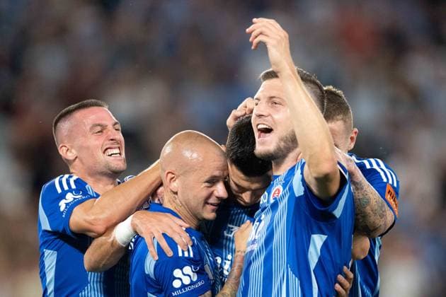 Marko Tolic a goal celebrate with his teammates during UEFA Champions league preliminary quaterfinal match, SK Slovan Bratislava - NK Celje, 30. july 2024 Copyright: xMICHALxFAJT,ZOSPORTU.SKx DSC_5947