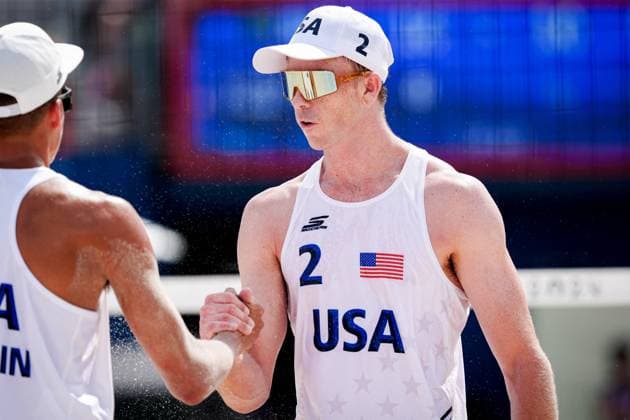 Paris 2024 - Men’s Beach Volley Miles Partain and Andrew Benesh of USA during the Paris 2024 Olympic Games, Olympische Spiele, Olympia, OS at the Eiffel Tower Stadium, in Paris, France on August 1, 2024. Photo by Julien Poupart ABACAPRESS.COM Paris France  Copyright: xPoupartxJulien ABACAx