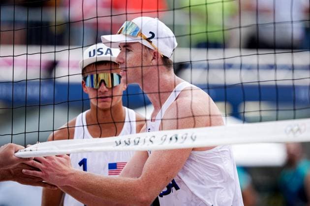 Paris 2024 - Men’s Beach Volley Miles Partain and Andrew Benesh of USA during the Paris 2024 Olympic Games, Olympische Spiele, Olympia, OS at the Eiffel Tower Stadium, in Paris, France on August 1, 2024. Photo by Julien Poupart ABACAPRESS.COM Paris France  Copyright: xPoupartxJulien ABACAx