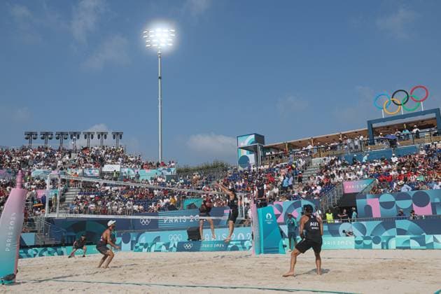 (240802) -- PARIS, Aug. 2, 2024 -- Samuel Schachter Daniel Dearing of Canada compete against Julian Hoerl Alexander Horst (R) of Austria during the men s preliminary phase pool E of Beach volleyball, Beachvolleyball at the Paris 2024 Olympic Games, Olympische Spiele, Olympia, OS in Paris, France, Aug. 2, 2024. ) (PARIS2024) FRANCE-PARIS-OLY-BEACH VOLLEYBALL HuangxZongzhi 