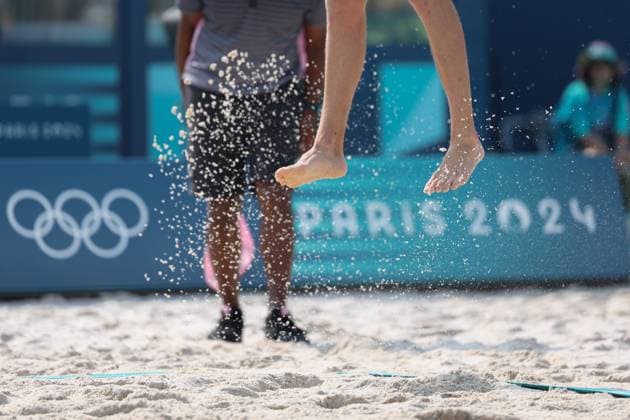 (240802) -- PARIS, Aug. 2, 2024 -- Samuel Schachter of Canada competes during the men s preliminary phase pool E of Beach volleyball, Beachvolleyball between Julian Hoerl Alexander Horst of Austria and Samuel Schachter Daniel Dearing of Canada at the Paris 2024 Olympic Games, Olympische Spiele, Olympia, OS in Paris, France, Aug. 2, 2024. ) (PARIS2024) FRANCE-PARIS-OLY-BEACH VOLLEYBALL HuangxZongzhi 