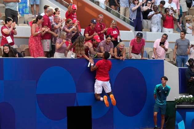 August 2, 2024, Paris, France: Canada s Felix Auger-Aliassime celebrates with supporters after winning the mixed doubles bronze-medal match against Demi Schuurs and Wesley Koolhoof of the Netherlands at the Summer Olympics in Paris on Friday, Aug.2, 2024. Canada News - August 2, 2024  - ZUMAc35_ 20240802_zaf_c35_032 Copyright: xAdrianxWyldx