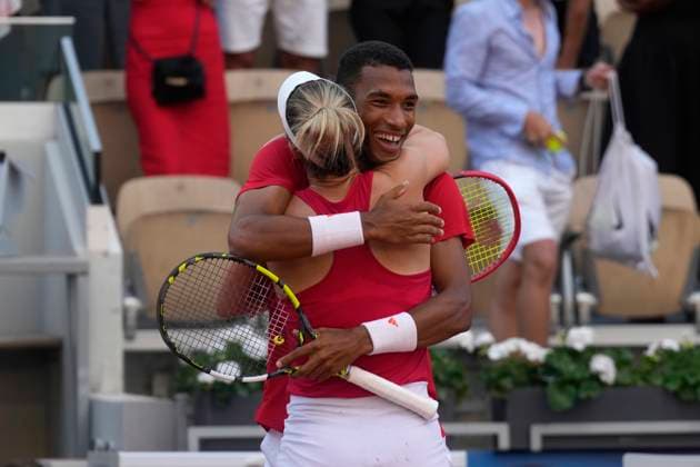 August 2, 2024, Paris, France: Canada s Felix Auger-Aliassime and Gabriela Dabrowski celebrate their win in the mixed doubles bronze-medal match against Demi Schuurs and Wesley Koolhoof of the Netherlands at the Summer Olympics in Paris on Friday, Aug.2, 2024. Canada News - August 2, 2024  - ZUMAc35_ 20240802_zaf_c35_035 Copyright: xAdrianxWyldx