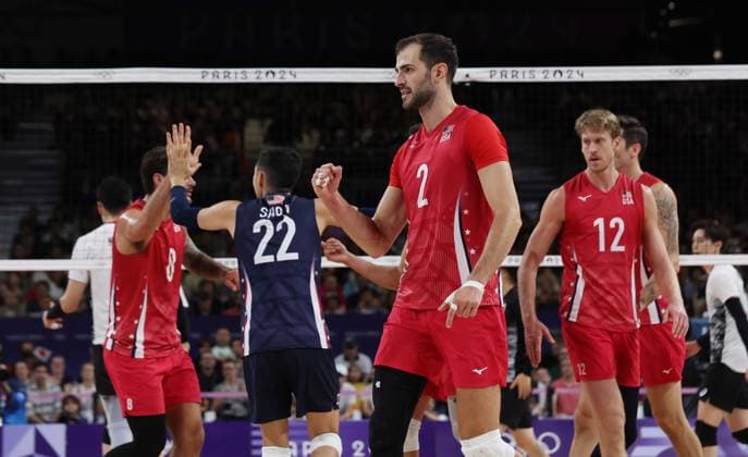 USA celebrate a point in their match against Japan in the Preliminary round of the Men s Volleyball at Porte De Versailles on the seventh day of the Paris Olympics on Friday, August 02, 2024.USA won the match 3 sets to one.  OLY202408021058 HUGOxPHILPOTT