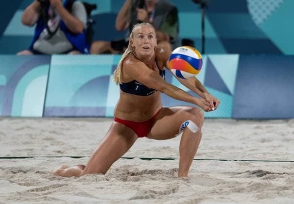 Sara Hughes of the USA returns a shot against the German team of Svenja Muller and Cinja Tillman at the Beach volleyball, Beachvolleyball Arena at the Summer Olympic Games, Olympische Spiele, Olympia, OS in Paris, France, on Friday, August 2, 2024. Hughes and Kelly Cheng of the USA won 2-0.  OLY20240802006 KatexBenic