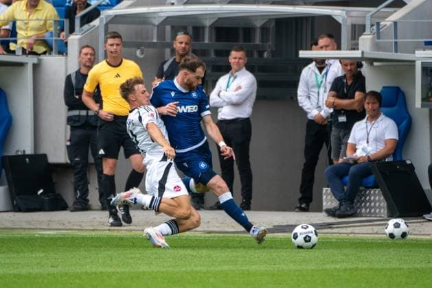 03.08.2024, xhfmx, Fussball 2.Bundesliga, Karlsruher SC - 1.FC Nürnberg emspor, v.l. Finn Jeltsch (1. FC Nürnberg), Budu Zivzivadze (Karlsruher SC) (DFL DFB REGULATIONS PROHIBIT ANY USE OF PHOTOGRAPHS as IMAGE SEQUENCES and or QUASI-VIDEO) Karlsruhe