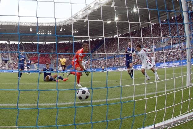 03.08.2024 - Fussball - Saison 2024 2025 - 2. Fussball - Bundesliga - 01. Spieltag: Karlsruher SC KSC - 1. FC Nürnberg FCN ( Club ) - Sportfoto Zink DaMa - xdaxmax - DFL regulations prohibit any use of photographs as image sequences and or quasi-video - only for editorial use - Tor Treffer Torschuß zum 1:0 - Torschütze Kanji Okunuki (11, 1. FC Nürnberg FCN ) gegen Max Weiß Weiss (1, Karlsruher SC KSC )