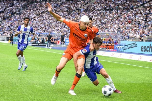 03.08.2024, xlakx, Fussball 2.Bundesliga, Hertha BSC Berlin - SC Paderborn emspor, v.l. Filip Bilbija (SC Paderborn 07),Diego Demme (Hertha BSC),Zweikampf, Duell, Kampf, tackle (DFL DFB REGULATIONS PROHIBIT ANY USE OF PHOTOGRAPHS as IMAGE SEQUENCES and or QUASI-VIDEO) Daniel Lakomski JAN Huebner Berlin