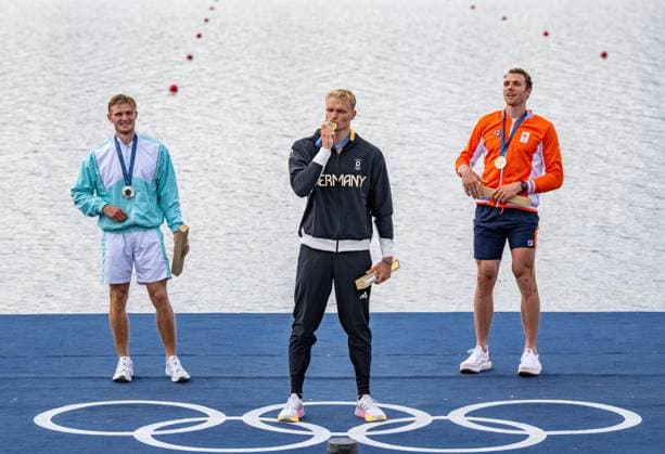 (240803) -- VAIRES-SUR-MARNE, Aug. 3, 2024 -- Gold medalist Oliver Zeidler (C) of Germany, silver medalist Yauheni Zalaty of AIN (Individual Neutral Athlete) and bronze medalist Simon van Dorp (R) of the Netherlands attend the awarding ceremony after the men s single sculls final A of rowing at the Paris 2024 Olympic Games, Olympische Spiele, Olympia, OS in Vaires-sur-Marne, France, on Aug. 3, 2024. ) (PARIS2024) FRANCE-VAIRES-SUR-MARNE-OLY-ROWING SunxFei 