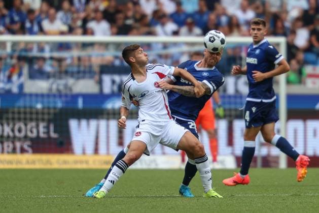 Kopfball, Kopfballduell, Luftzweikampf, Lufthoheit, Kopfballspiel Marcel Franke ( Karlsruher SC, 28) vs. Stefanos Tzimas ( 1. FC Nuernberg, 09 ) Karlsruher SC vs. 1. FC Nuernberg, Fussball, 2. Liga, 1. Spieltag, 2024 2025, 03.08.2024 , DFL REGULATIONS PROHIBIT ANY USE OF PHOTOGRAPHS AS IMAGE SEQUENCES AND OR QUASI-VIDEO. Karlsruher SC vs. 1. FC Nuernberg, Fussball, 2. Liga, 1. Spieltag, 2024 2025, 03.08.2024 Karlsruhe