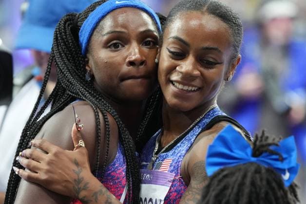 Silver medalist Sha carri Richardson of the U.S. (R) hugs teammate Twanisha Terry after the Women s 100m Final during the Athletics competition at the Paris 2024 Olympic Games, Olympische Spiele, Olympia, OS in Paris, France, on Saturday, August 3, 2024.  OLY2024080319582 PATxBENIC