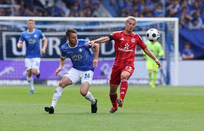 04.08.2024, xdcx, Fussball 2. Bundesliga, SV Darmstadt 98 - Fortuna Düsseldorf, emonline, emspor, despor, v.l., Matthias Bader (SV Darmstadt 98), Shinta Appelkamp (Fortuna Düsseldorf) DFL DFB REGULATIONS PROHIBIT ANY USE OF PHOTOGRAPHS AS IMAGE SEQUENCES AND OR QUASI-VIDEO.