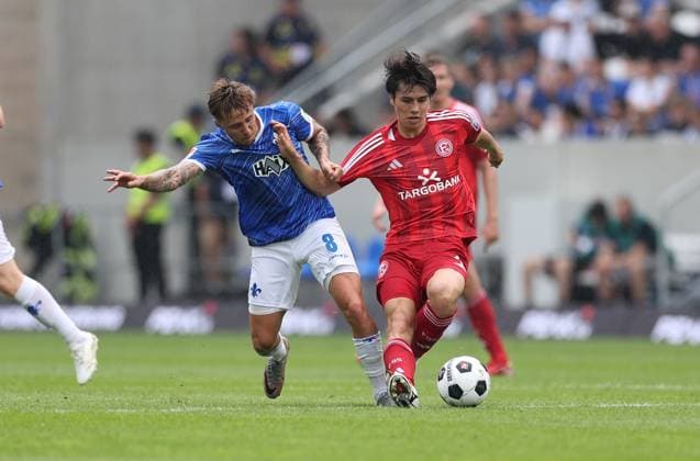 04.08.2024, xdcx, Fussball 2. Bundesliga, SV Darmstadt 98 - Fortuna Düsseldorf, emonline, emspor, despor, v.l., Luca Marseiler (SV Darmstadt 98), Ao Tanaka (Fortuna Düsseldorf) DFL DFB REGULATIONS PROHIBIT ANY USE OF PHOTOGRAPHS AS IMAGE SEQUENCES AND OR QUASI-VIDEO.
