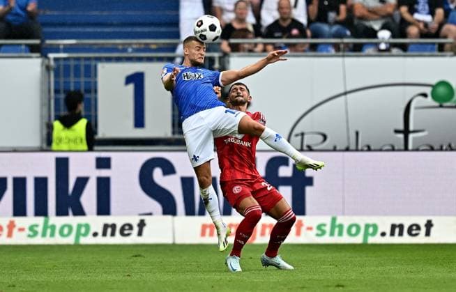 04.08.2024, xfux, Fussball 2.Bundesliga, SV Darmstadt 98 - Fortuna Düsseldorf emspor, v.l. Fabian Nürnberger Nuernberger (SV Darmstadt 98), Matthias Zimmermann (Fortuna Duesseldorf Düsseldorf) Kopfball, Kopfballduell (DFL DFB REGULATIONS PROHIBIT ANY USE OF PHOTOGRAPHS as IMAGE SEQUENCES and or QUASI-VIDEO. Eine Lizenzierung des Lichtbildwerkes an den SV Darmstadt 1898 e.V. sowie Tochterunternehmen ist nicht gestattet. No release of or sale to SV Darmstadt 1898 e.V.) Darmstadt