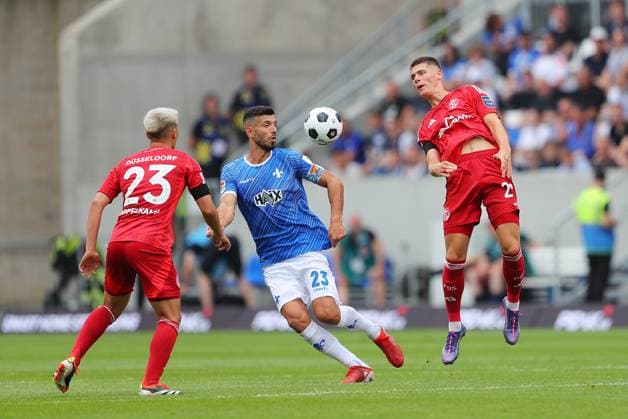 04.08.2024, xtvx, Fussball 2.Bundesliga, SV Darmstadt 98 - Fortuna Düsseldorf emspor, v.l. Zweikampf, Duell, duel, tackle, compete Shinta Appelkamp (Fortuna Duesseldorf) Klaus Gjasula (SV Darmstadt 98) (DFL DFB REGULATIONS PROHIBIT ANY USE OF PHOTOGRAPHS as IMAGE SEQUENCES and or QUASI-VIDEO) Darmstadt