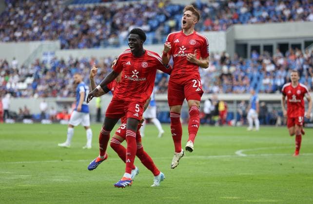 04.08.2024, xdcx, Fussball 2. Bundesliga, SV Darmstadt 98 - Fortuna Düsseldorf, emonline, emspor, despor, v.l., Torjubel zum 0:2 durch Tim Rossmann (Fortuna Düsseldorf), Joshua Quarshie (Fortuna Düsseldorf), Goal celebration, celebrate the goal DFL DFB REGULATIONS PROHIBIT ANY USE OF PHOTOGRAPHS AS IMAGE SEQUENCES AND OR QUASI-VIDEO.