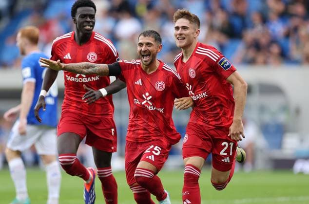 04.08.2024, xdcx, Fussball 2. Bundesliga, SV Darmstadt 98 - Fortuna Düsseldorf, emonline, emspor, despor, v.l., Torjubel zum 0:2 durch Tim Rossmann (Fortuna Düsseldorf), Joshua Quarshie (Fortuna Düsseldorf), Matthias Zimmermann (Fortuna Düsseldorf), Goal celebration, celebrate the goal DFL DFB REGULATIONS PROHIBIT ANY USE OF PHOTOGRAPHS AS IMAGE SEQUENCES AND OR QUASI-VIDEO.