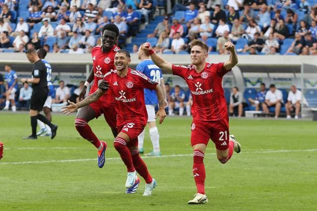 04.08.2024, xtvx, Fussball 2.Bundesliga, SV Darmstadt 98 - Fortuna Düsseldorf emspor, v.l. Goal scored, Tor zum 0:2 Tim Rossmann (Fortuna Duesseldorf) Torjubel, Goal celebration, celebrate the goal, celebrates scoringJoshua Quarshie (Fortuna Duesseldorf) Matthias Zimmermann (Fortuna Duesseldorf) Tim Rossmann (Fortuna Duesseldorf) (DFL DFB REGULATIONS PROHIBIT ANY USE OF PHOTOGRAPHS as IMAGE SEQUENCES and or QUASI-VIDEO) Darmstadt