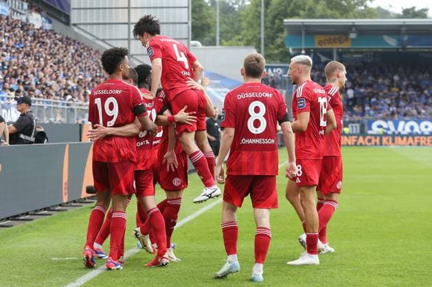04.08.2024, xtvx, Fussball 2.Bundesliga, SV Darmstadt 98 - Fortuna Düsseldorf emspor, v.l. Goal scored, Tor zum 0:2 Tim Rossmann (Fortuna Duesseldorf) Torjubel, Goal celebration, celebrate the goal, celebrates scoringJoshua Quarshie (Fortuna Duesseldorf) Matthias Zimmermann (Fortuna Duesseldorf) Tim Rossmann (Fortuna Duesseldorf) (DFL DFB REGULATIONS PROHIBIT ANY USE OF PHOTOGRAPHS as IMAGE SEQUENCES and or QUASI-VIDEO) Darmstadt