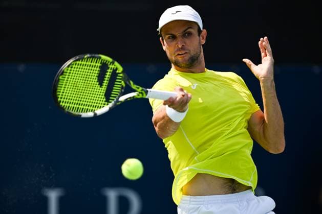 MONTREAL, QC - AUGUST 04: Arthur Rinderknech (FRA) returns the ball during a qualifying round match at ATP, Tennis Herren National Bank Open on August 04, 2024 at IGA Stadium in Montreal, QC (Photo by David Kirouac Icon Sportswire) TENNIS: AUG 04 National Bank Open EDITORIAL USE ONLY Icon240804016