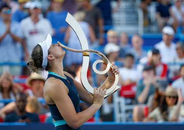 August 4, 2024: Paula Badosa (ESP) kisses the championship trophy after the final of the 2024 Mubadala Citi DC Open tennis tournament being played at Rock Creek Park Tennis Center in Washington, D.C. CSM District Of Columbia United States of America - ZUMAc04_ 20240804_zma_c04_263 Copyright: xJustinxCooperx