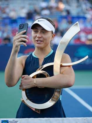 August 4, 2024: Paula Badosa (ESP) records a video at center court with the championship trophy after the final of the 2024 Mubadala Citi DC Open tennis tournament being played at Rock Creek Park Tennis Center in Washington, D.C. CSM District Of Columbia United States of America - ZUMAc04_ 20240804_zma_c04_279 Copyright: xJustinxCooperx