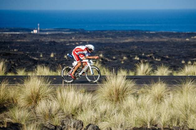 2015 Ironman World Championships - Kona Jan Frodeno (DEU) on the Queen Ka ahumanu highway racing through the lava fields. Photo: Iri Greco BrakeThrough Media Photonews Kona Hawaii  Copyright: xBrakethroughxMediax 10551503-076