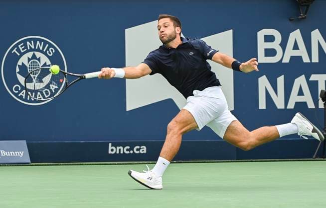August 5, 2024, Montreal, Pq, Canada: Alexis Galarneau of Canada lunges for the ball during his qualifying match against Rinky Hijikata of Australia at the National Bank Open tennis tournament in Montreal, Monday, August 5, 2024. Canada News - August 5, 2024  - ZUMAc35_ 20240805_zaf_c35_011 Copyright: xGrahamxHughesx