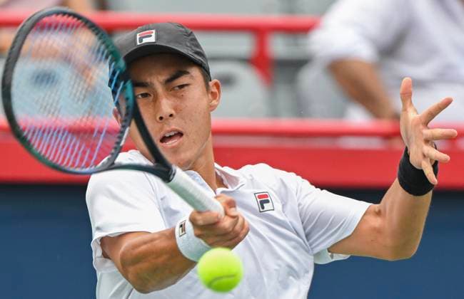 August 5, 2024, Montreal, Pq, Canada: Rinky Hijikata of Australia plays a shot to Alexis Galarneau of Canada during their qualifying match at the National Bank Open tennis tournament in Montreal, Monday, August 5, 2024. Canada News - August 5, 2024  - ZUMAc35_ 20240805_zaf_c35_017 Copyright: xGrahamxHughesx