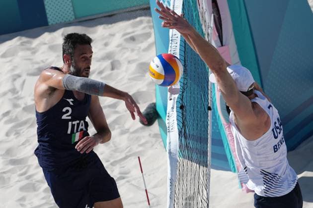 Samuele Cottafava and Paolo Nicolai during a men™s beach volley match between Italy and USA at 2024 Olympics, Monday, August 5, 2024, in Paris, France.  Copyright: xGianxMattiaxD Alberto LaPressex