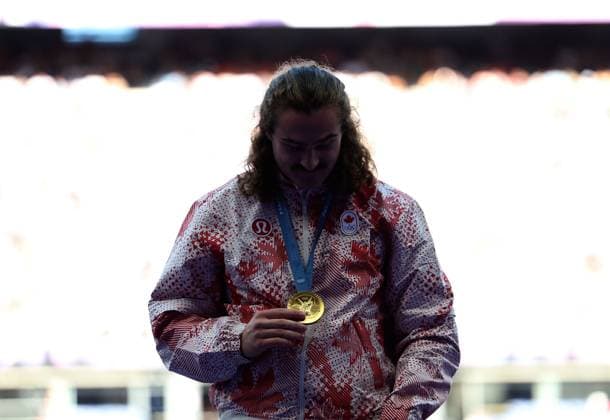 (240805) -- PARIS, Aug. 5, 2024 -- Gold medalist Ethan Katzberg of Canada reacts during the victory ceremony of the men s hammer throw of Athletics at the Paris 2024 Olympic Games, Olympische Spiele, Olympia, OS in Paris, France, Aug. 5, 2024. ) (PARIS2024) FRANCE-PARIS-OLY-ATHLETICS-HAMMER THROW-MEN LixYing 