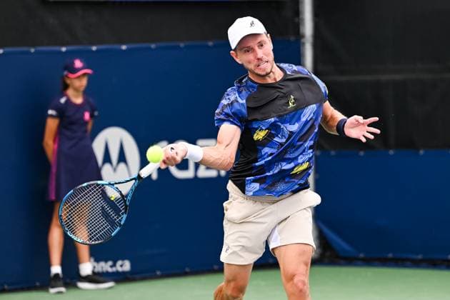 MONTREAL, QC - AUGUST 05: James Duckworth (AUS) returns the ball during a qualifying round match at ATP, Tennis Herren National Bank Open on August 05, 2024 at IGA Stadium in Montreal, QC (Photo by David Kirouac Icon Sportswire) TENNIS: AUG 05 National Bank Open EDITORIAL USE ONLY Icon240805015