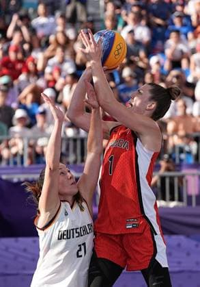 (240805) -- PARIS, Aug. 5, 2024 -- Michelle Plouffe (R) of Canada shoots during the women s semifinal of 3x3 basketball between Germany and Canada at the Paris 2024 Olympic Games, Olympische Spiele, Olympia, OS in Paris, France, Aug. 5, 2024. ) (PARIS2024) FRANCE-PARIS-OLY-3x3 BASKETBALL ZhuxZheng 