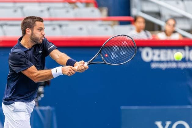 August 5, 2024, Montreal, Quebec, Canada: ALEXIS GALARNEAU from Canada returning service against Rinky Hijikata from Australia on central in qualification round at Canadian Open tennis tournament at IGA Stadium. Montreal Canada - ZUMA 20240805_mda_l189_585 Copyright: xYannickxLegarex