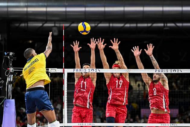Adriano of Brazil attacking, Micah Christenson, Taylor Averill and Torey Defalco of USA defending during the Men s Volleyball Quarter Final between USA and Brazil at the Paris Olympics 2024 at the South Paris Arena in Paris, France. (Richard Callis SPP) Copyright: xRichardxCallis SPPx spp-en-RiCa-RM4_richiecallis_05082024v-1722