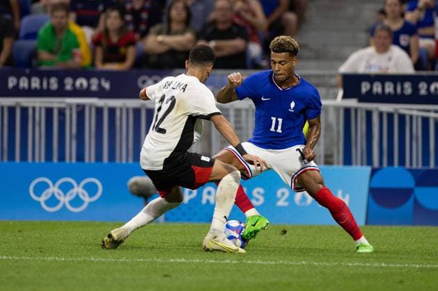 Lyon, France, August 5th 2024: Ahmed Koka (12 Egypt) and Desire Doue (11 France) battle for the ball during the Olympic Games, Olympische Spiele, Olympia, OS Paris 2024 Men semi-final football match between France and Egypt at Stade de Lyon in Lyon, France. (Ane Frosaker SPP) Copyright: xAnexFrosakerx xSPPx spp-en-AnFrSp-_F_26329
