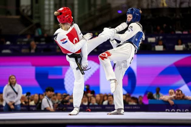 Sport Themen der Woche KW32 Sport Bilder des Tages Olympic Games, Olympische Spiele, Olympia, OS Paris 2024: Women s Taekwondo - Lena Stojkovic of Croatia v Josipa Kafadar of Canada Lena Stojkovic of Croatia (red) and Josipa Kafadar of Canada (blue) compete during the Women s Taekwondo -49kg Round of 16 on day twelve of the Olympic Games Paris 2024 at Grand Palais on August 7, 2024 in Paris, France.  IgorxKralj PIXSELL
