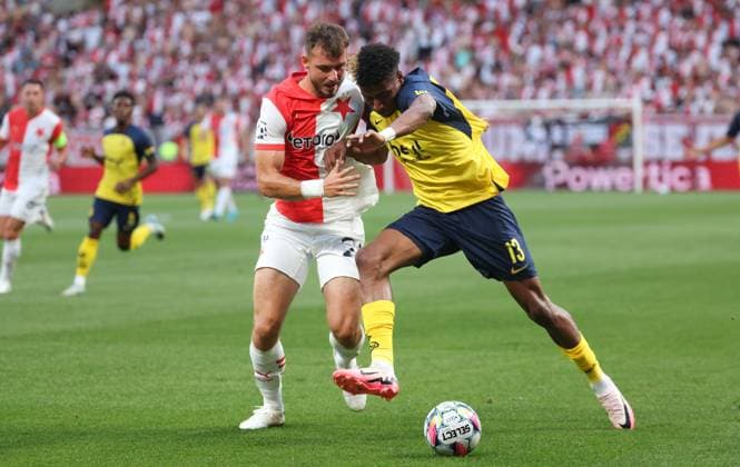 Slavia Prague s Filip Prebsl and Union s Kevin Rodriguez fight for the ball during a game between Czech SK Slavia Prague and Belgian soccer team Union Saint-Gilloise in Prague, Czech Republic, on Wednesday 07 August 2024, a first leg game in the third qualifying round for the UEFA Champions League competition. VIRGINIExLEFOUR  x98010034x